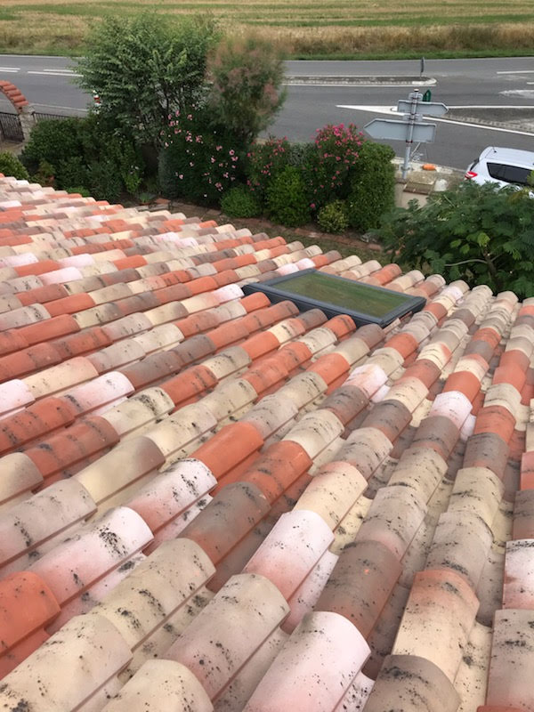 Carousselle de photo d'un chantier de d'isolation de toiture par sarking pour une lauragaise sur les hauteur de Toulouse